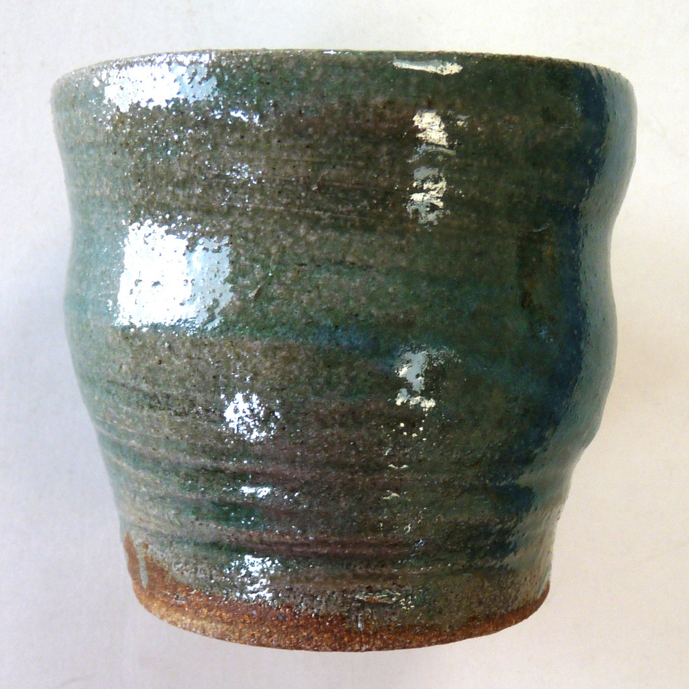 Thrown green stoneware art studio pottery pot vase